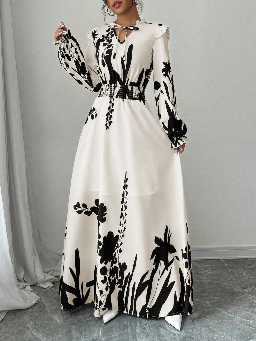 Maxi dress for women with a flattering cut and floral details Lune London