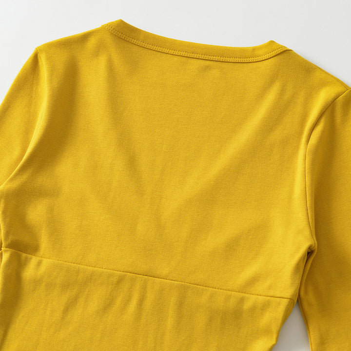 Women's body-hugging wrap shirt with deep V-neck, three-quarter sleeves, and waist accentuation Amarae