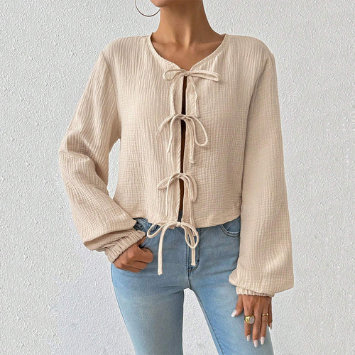 Short blouse top for women with sophisticated lace-up details Chic & Stil