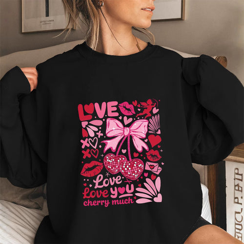 Sweat-shirt pour femmes avec des manches volumineuses et un motif cerise ludique Chic & Stil