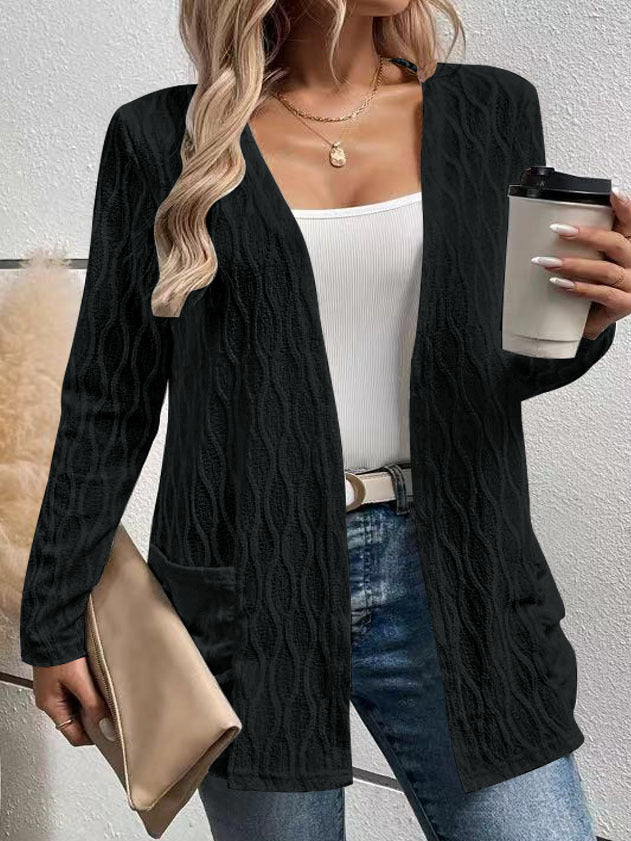 Women's knitted jacket with a refined wave pattern and practical pockets Lune London