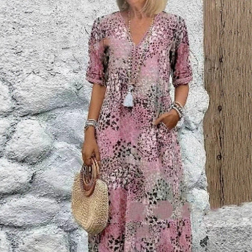 Maxi dress for women with V-neckline and practical side pockets Amarae