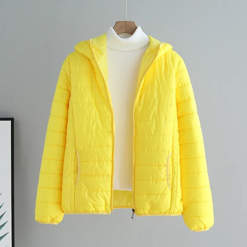 Ladies quilted transitional jacket with practical pockets and hood Amarae