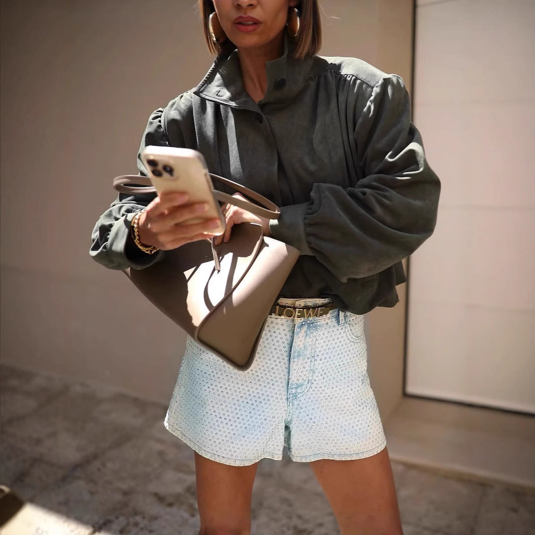 Oversized blouse for women with a chic pleated design and elegant button details Lune London