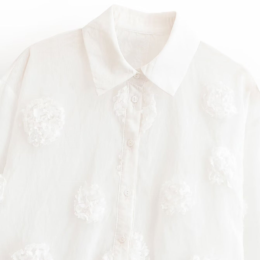 Women's blouse with three-quarter sleeves and three-dimensional flower appliqués Amarae