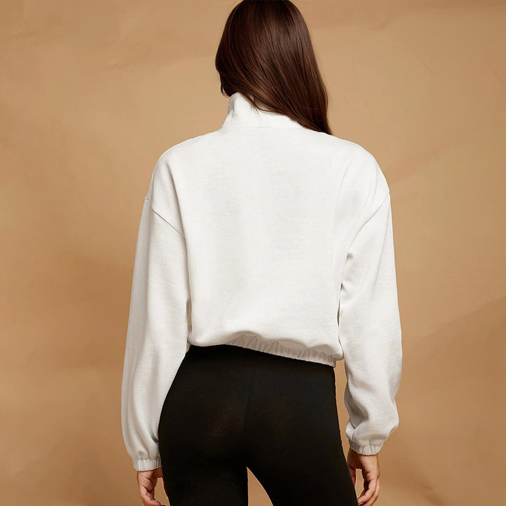 Haut de survêtement zippé décontracté pour femmes avec poche kangourou et ourlet élastique Chic & Stil