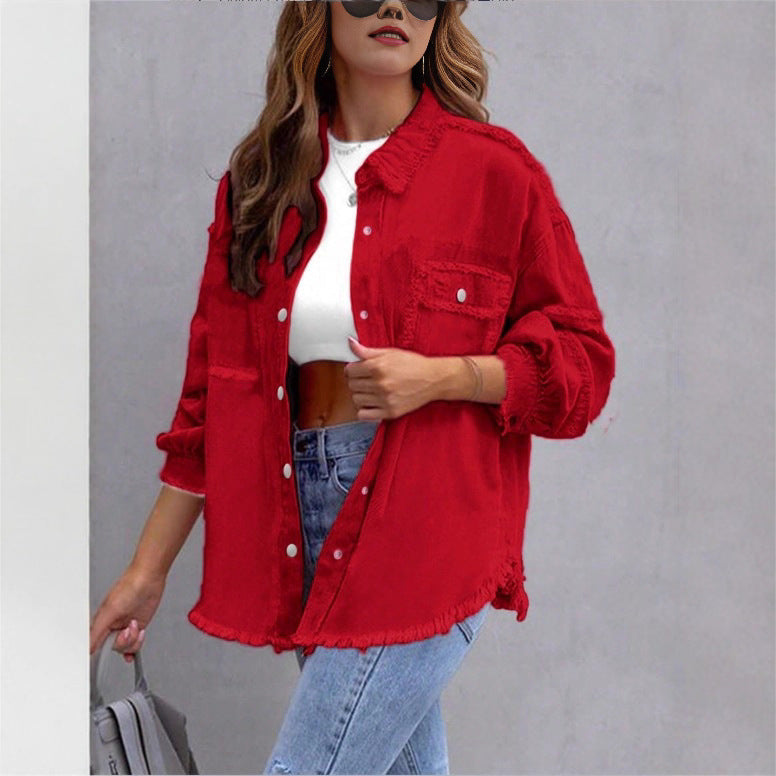 Women's oversized denim shirt jacket with fringe trim, flap pockets, and snap front Amarae