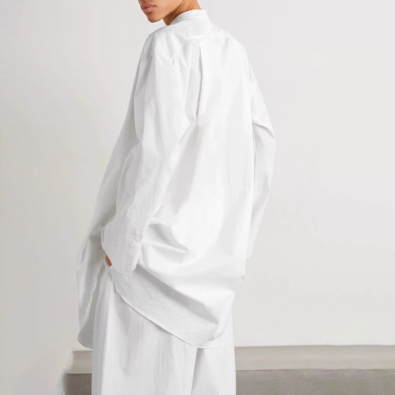 Blouse de mode femme avec col rond et coupe asymétrique Chic & Stil