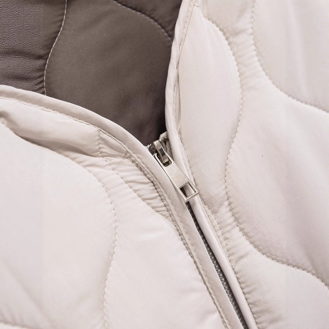 Veste de transition matelassée pour femmes avec poches latérales et coupe moderne Chic & Stil