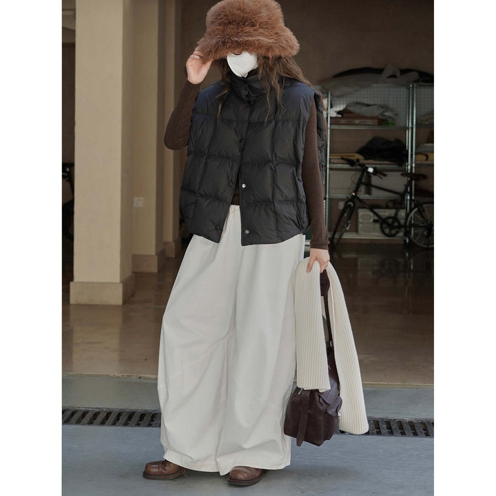 Women's lightweight quilted vest with high collar and snap button placket Amarae