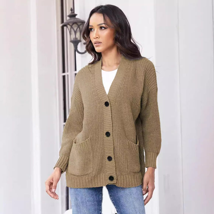 Knitted jacket for women with large pockets and classic button closure Lune London