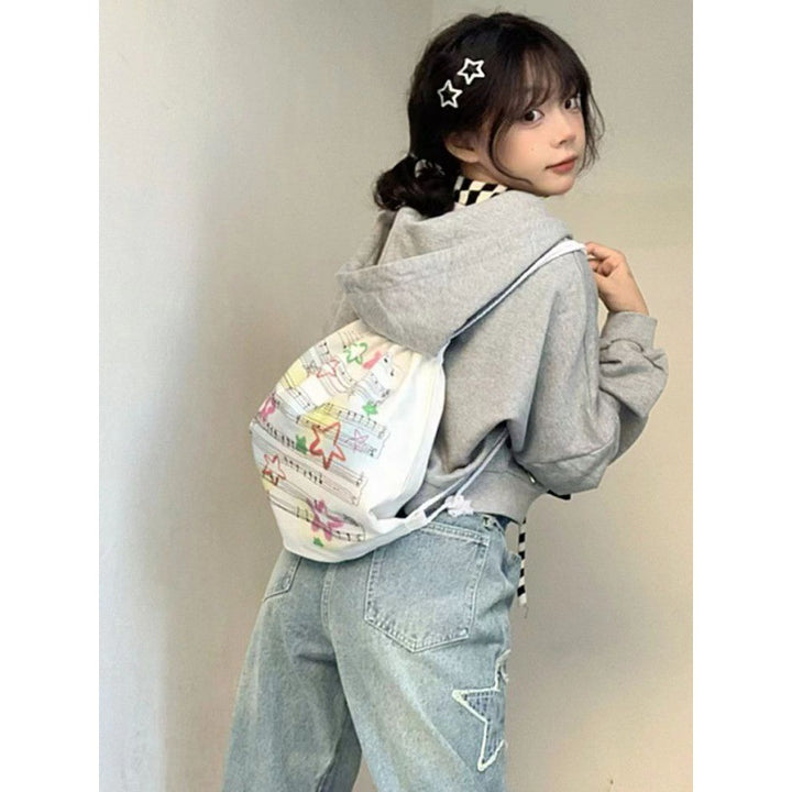 Women's cropped hoodie with creative star appliqués Chic & Stil