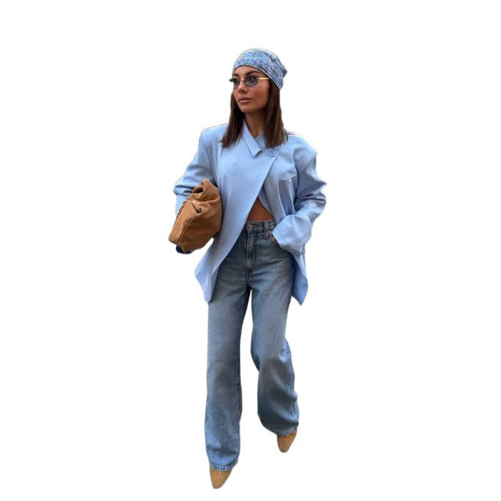 Women’s oversized long blazer with boxy silhouette, soft shoulders, and extended cut.