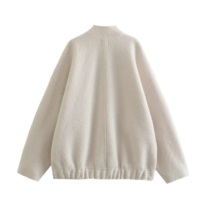 Ladies oversized fluffy coat with practical pockets and an elegant high collar Lune London