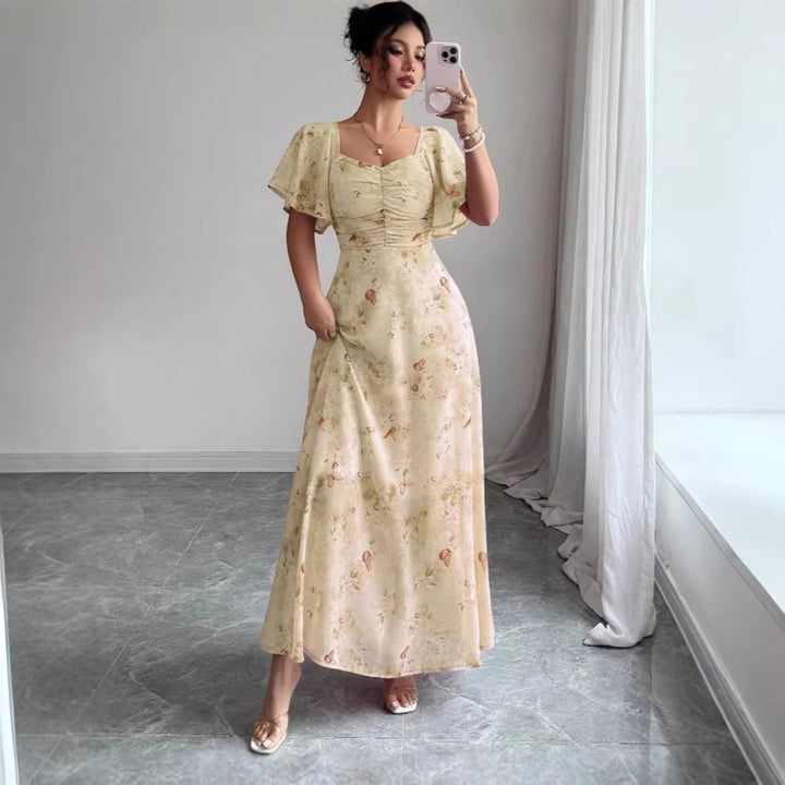 Women's maxi dress with flowing cut and romantic floral pattern Lune London