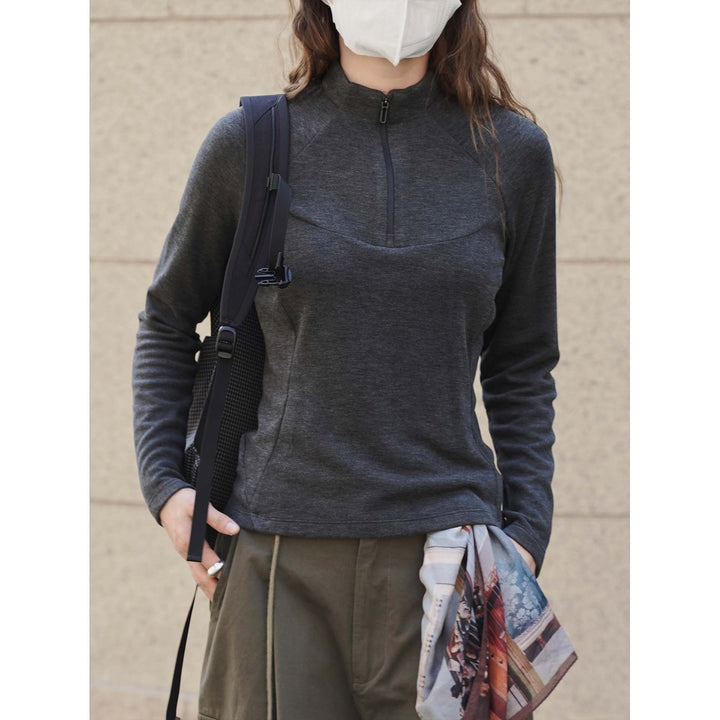 Women's fine-knit shirt with short zipper, raglan sleeves, and tailored seam design Amarae