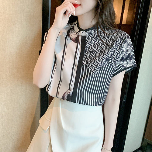 Blouse de mode femme avec motif graphique et détails élégants Chic & Stil