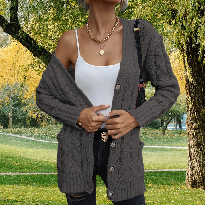 Ladies chunky knit cardigan with deep pockets and open cut Lune London