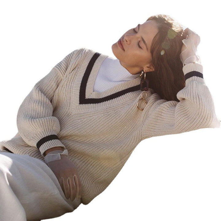 Trendy women's sweater with V-neck, puff sleeves, and textured fabric Lune London