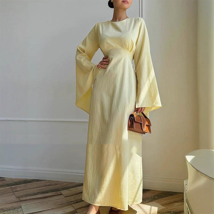 Ladies maxi dress with flared trumpet sleeves and fitted empire silhouette Amarae
