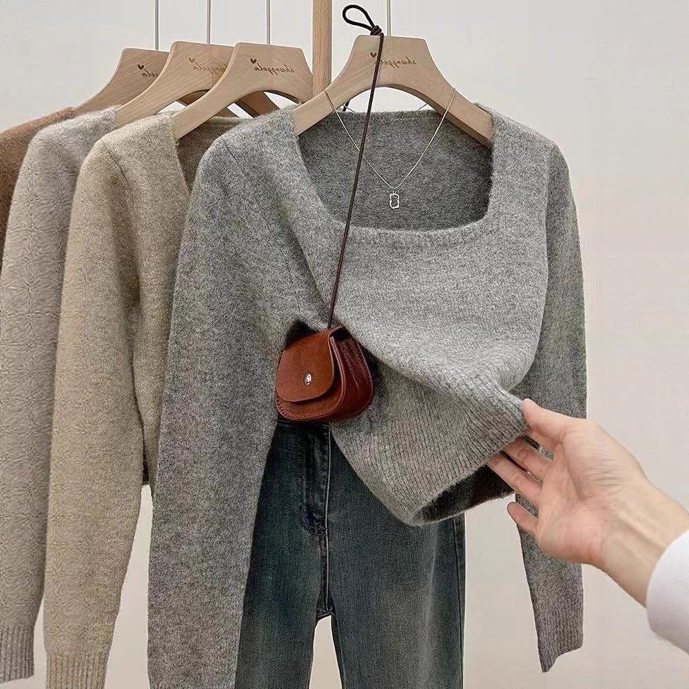 Pull féminin tendance avec encolure ronde large et texture fine Chic & Stil