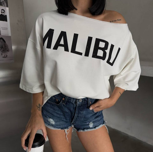 Oversized T-shirt for ladies with asymmetric neckline and contrasting print Amarae