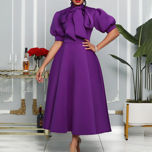 Elegant maxi dress for women with voluminous puff sleeves and a bow neckline Amarae