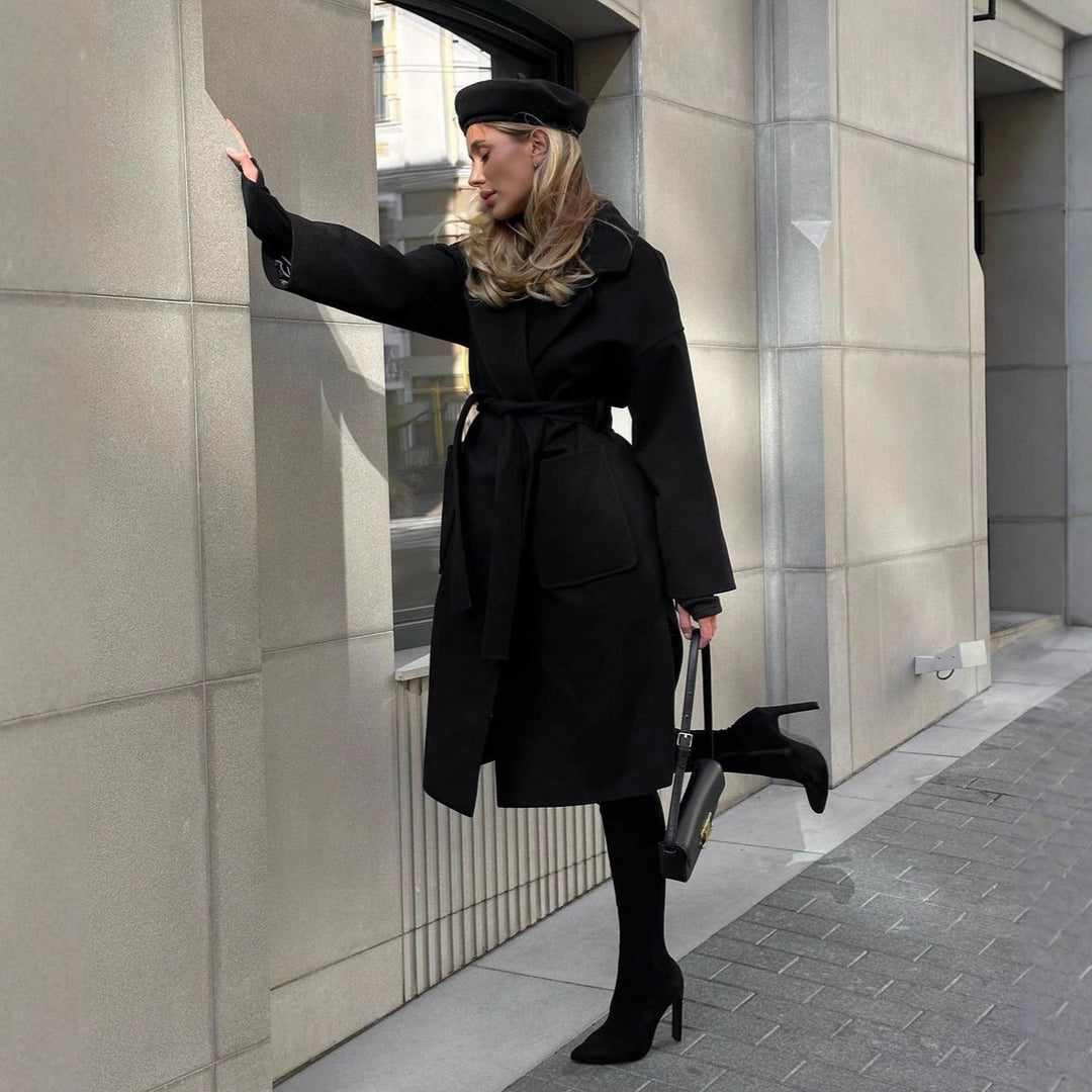 Elegant transitional coat for women with wide lapels and belt detail Lune London