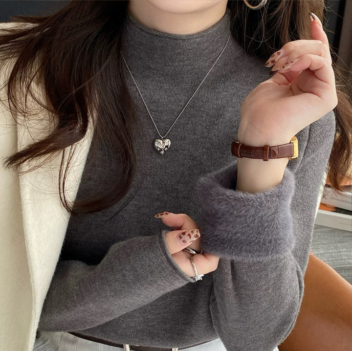 Pull en tricot pour femmes avec bordures duveteuses Chic & Stil