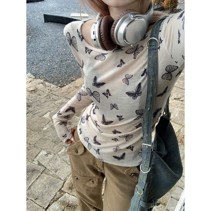 Women's long sleeve top with delicate butterfly pattern Chic & Stil