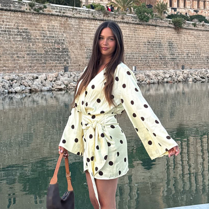 Ladies wrap mini dress with V-neck, bell sleeves and polka dot print Amarae
