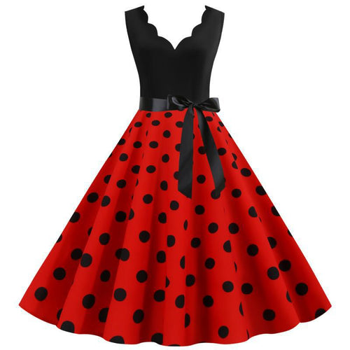 Robe swing femme avec un design moderne à pois et un élégant col en V Chic & Stil