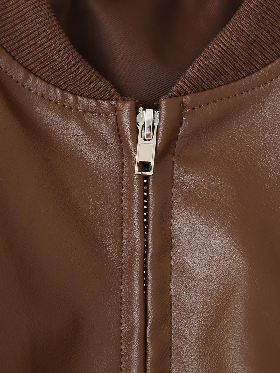 Women's leather bomber jacket with practical zip pockets and elastic waist Lune London