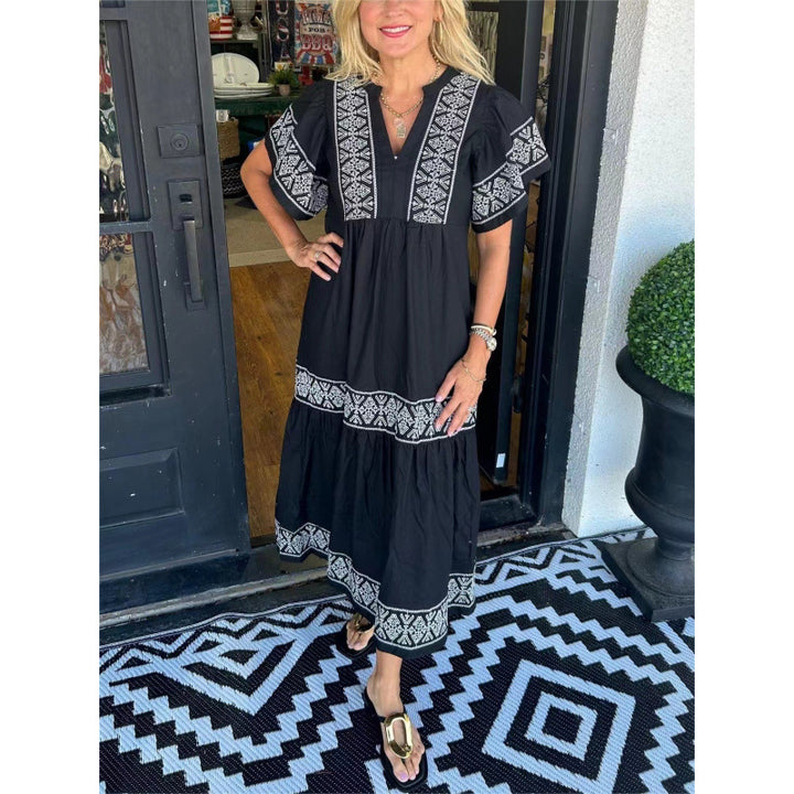 Maxi dress for women with refined embroidery details and a flared cut Lune London