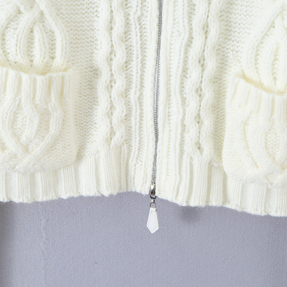 Ladies short knitted cardigan with stand-up collar, cable pattern, wooden button toggles and pockets Amarae