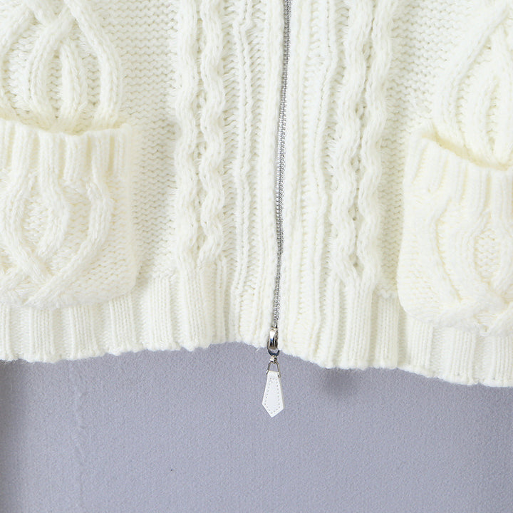 Ladies short knitted cardigan with stand-up collar, cable pattern, wooden button toggles and pockets Amarae