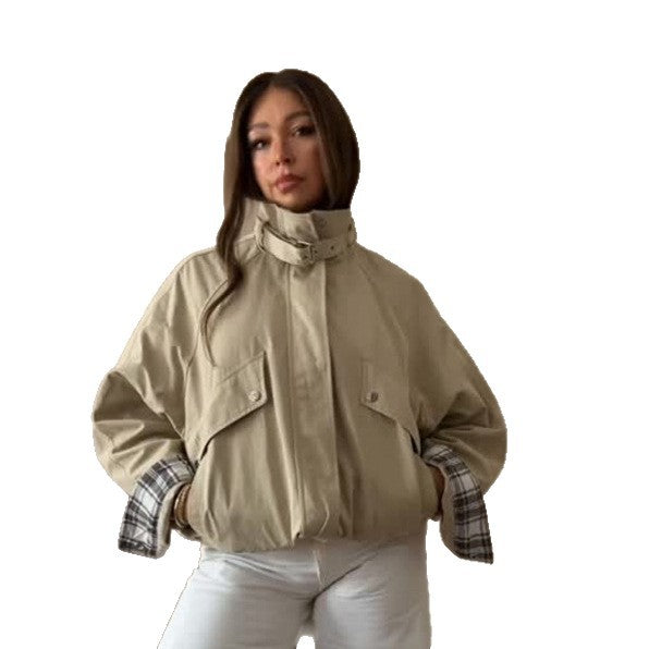 Women’s short bomber jacket with stand-up collar, chin strap, and checkered sleeve lining Amarae