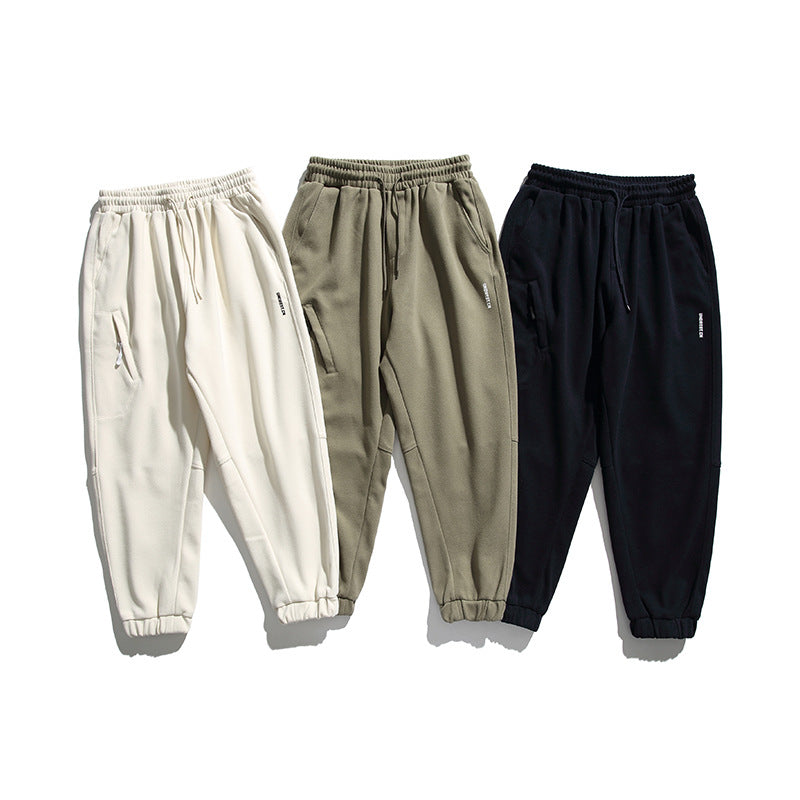 Unisex wide jogging pants in oversized cut with elastic waistband, knee panel and ribbed cuffs Amarae