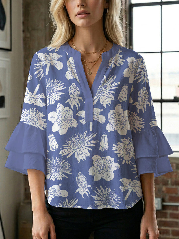 Ladies elegant blouse shirt with voluminous puff sleeves and graphic floral design Lune London