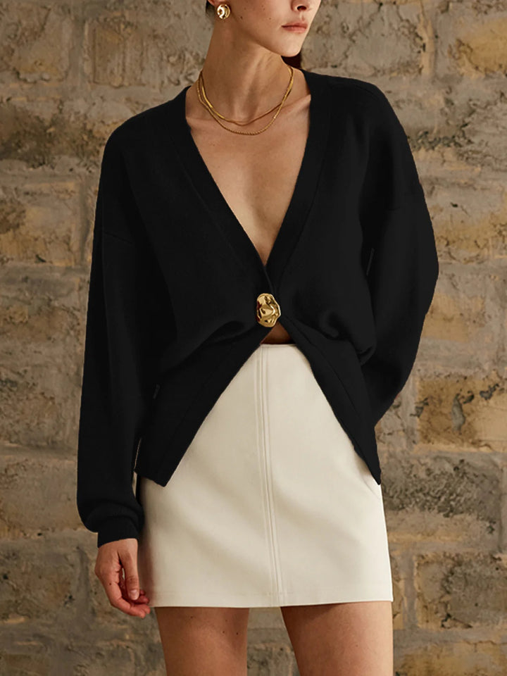 Elegant knitted cardigan for women with a deep V-neck and decorative button Lune London