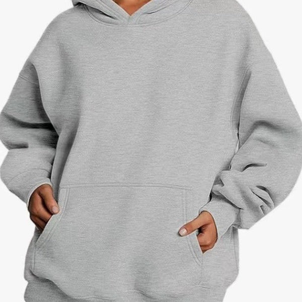 Women's oversized hoodie with practical kangaroo pockets and soft inner lining Chic & Stil