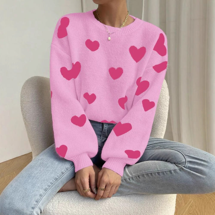 Knitted sweater for women with a catchy heart design and a relaxed fit Lune London