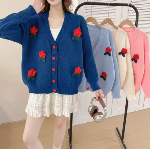 Women’s playful knitted cardigan with floral appliqués and Moon London button details