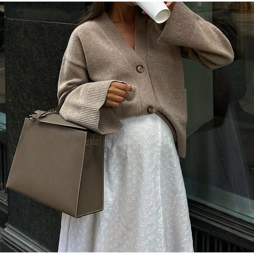 Women's knitted jacket with an elegant cut and oversized sleeves Amarae