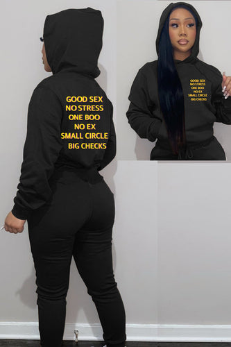 Women’s hoodie and jogging set with motivational writing and chic, relaxed fit