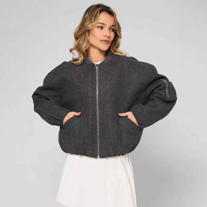 Puffed sleeve jacket for women, with practical zip pockets and elastic edges Lune London