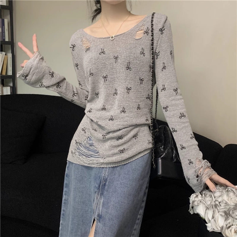 Women's long sleeve shirt with stylish rips and playful motif Lune London