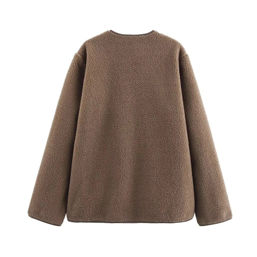 Ladies comfortable teddy jacket with practical pockets and button closure Lune London
