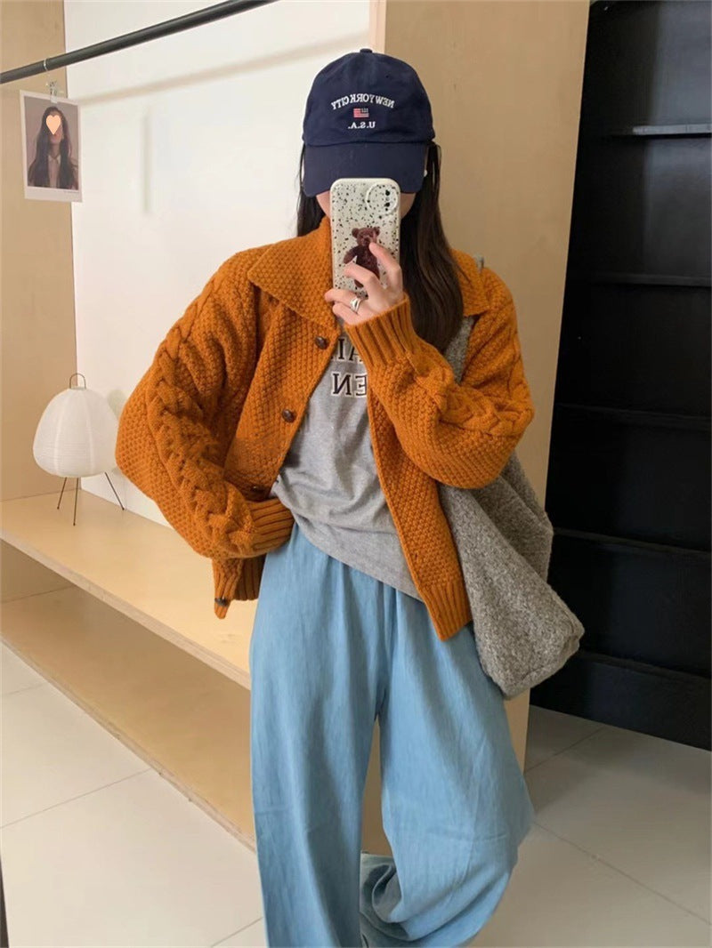 Women's oversized knitted jacket with cable design and chic texture and style