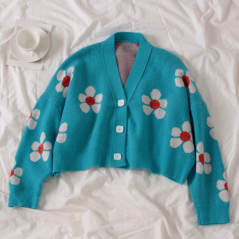 Short knitted cardigan for women with floral patterns and button details Lune London